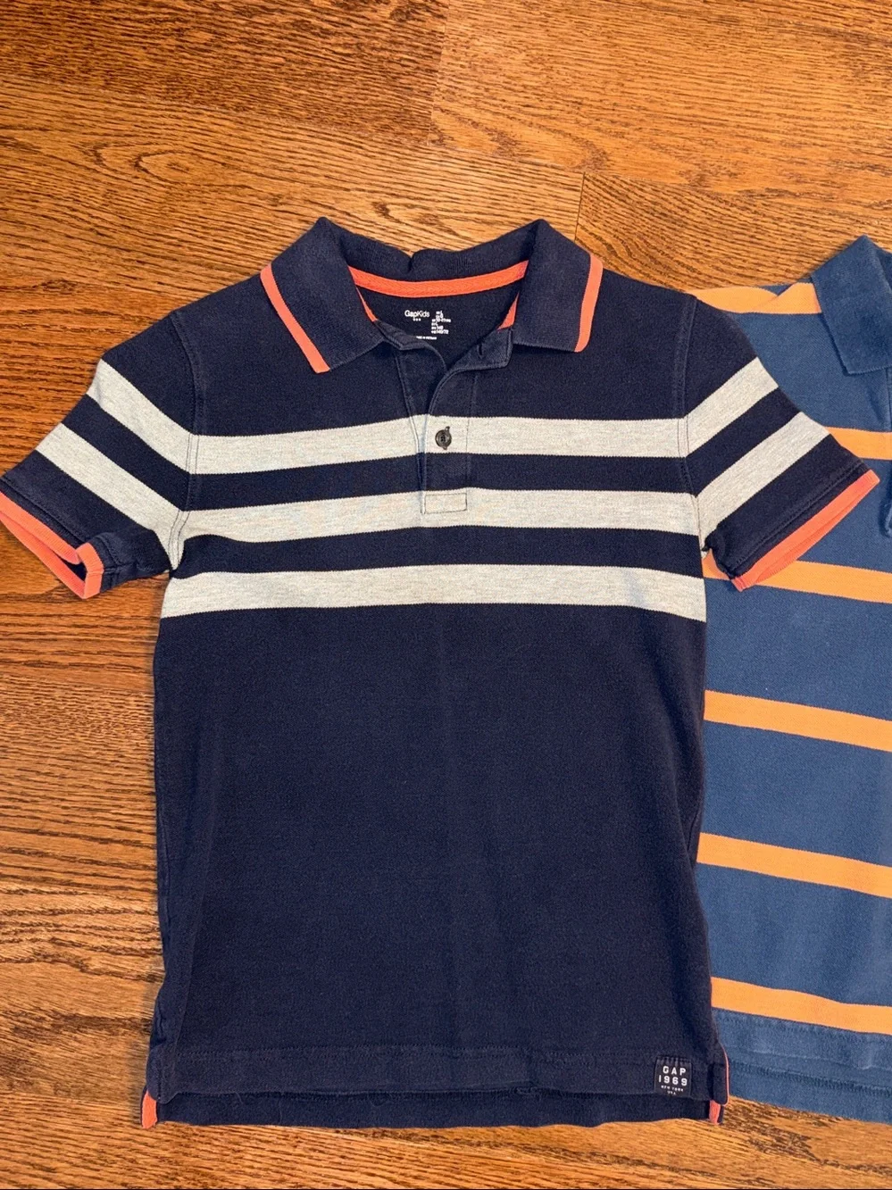 Size L/10 boys bundle of 2 Gap Kids short sleeve polo shirts.
